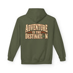 An military green pullover hoodie shown from the back, featuring a large graphic print that reads 'ADVENTURE IS THE DESTINATION' in beige and orange lettering with a small compass icon.