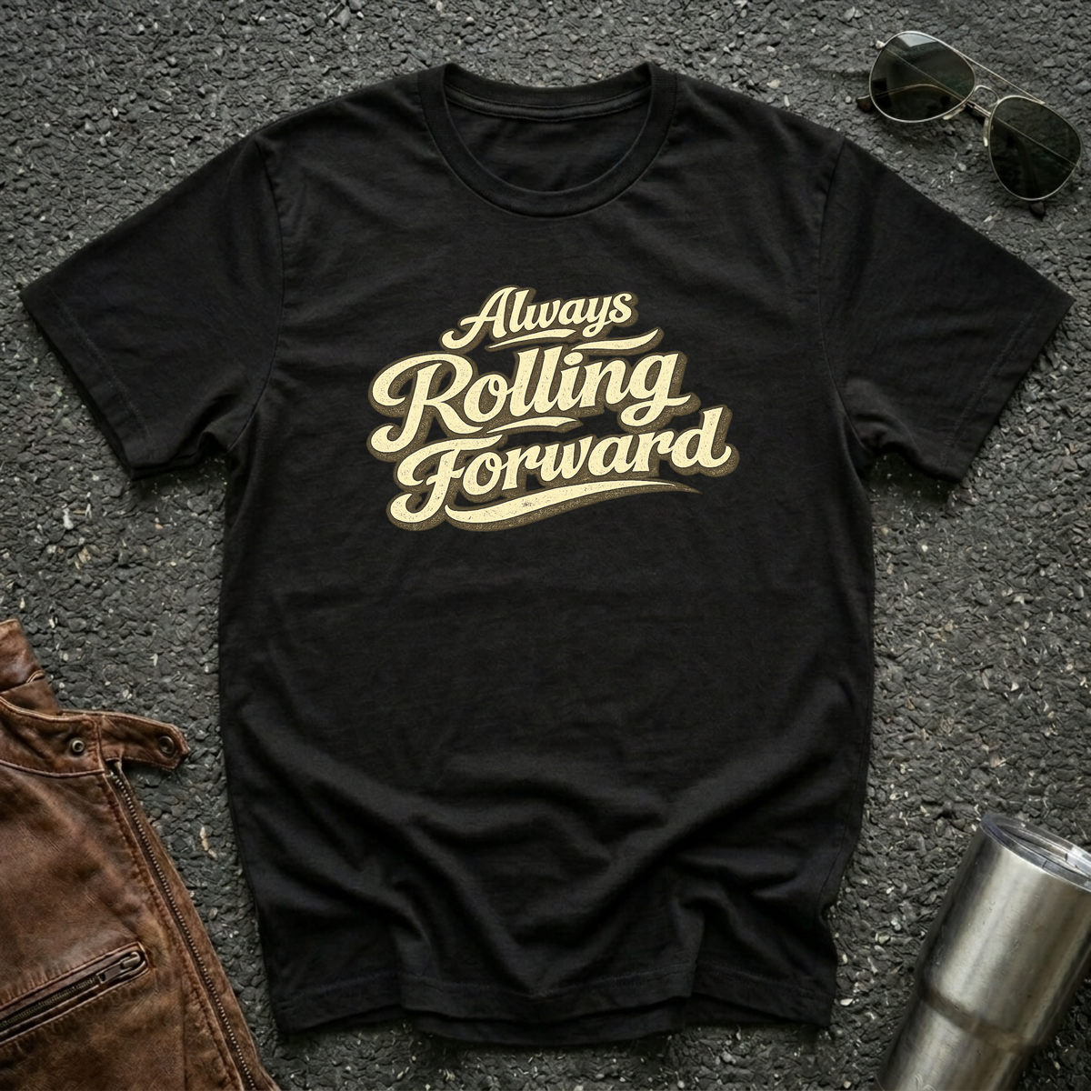Black 'Always Rolling Forward' road life T-shirt featuring vintage cream typography on a soft unisex tee.