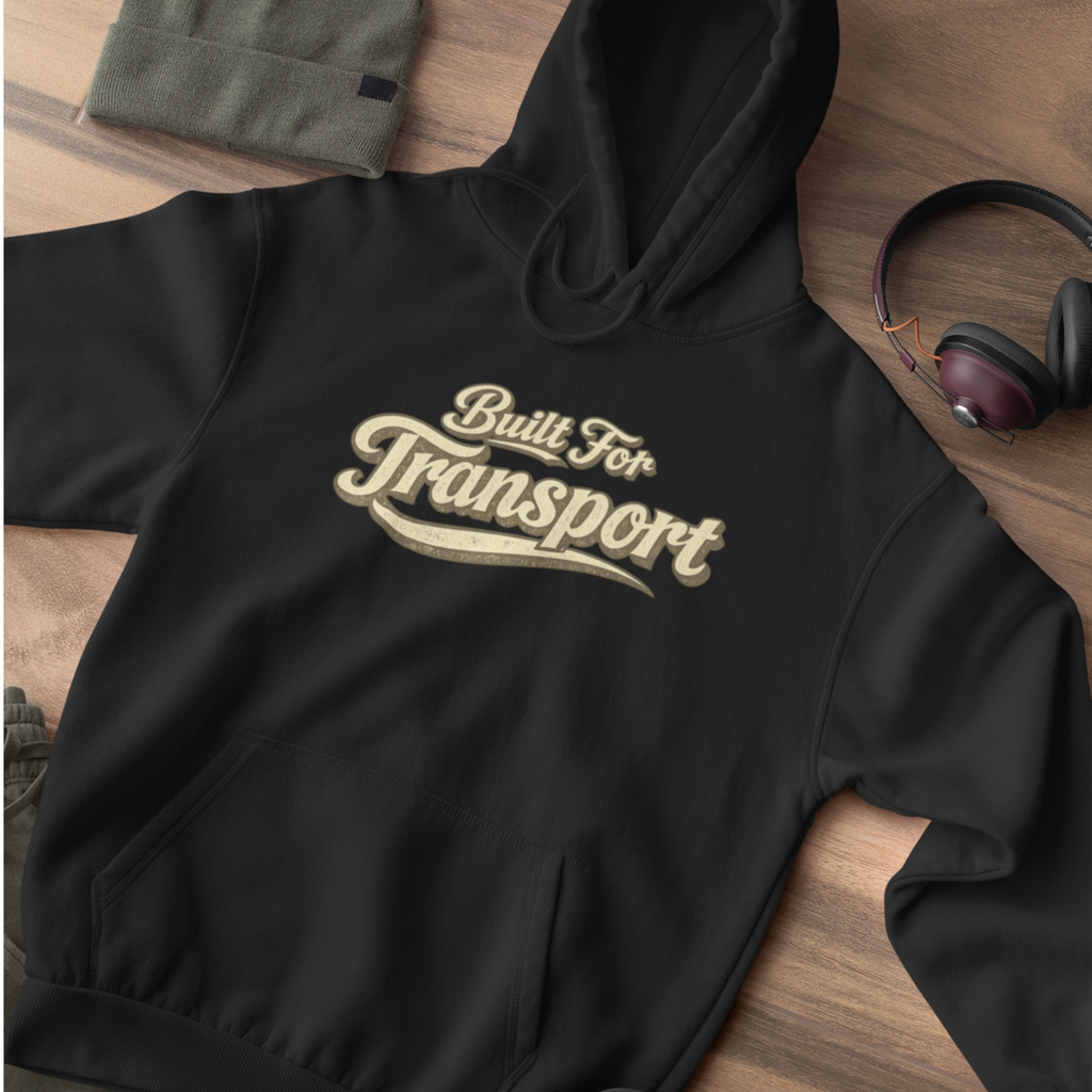 A black hoodie on a flat lay 'Built For Transport' 