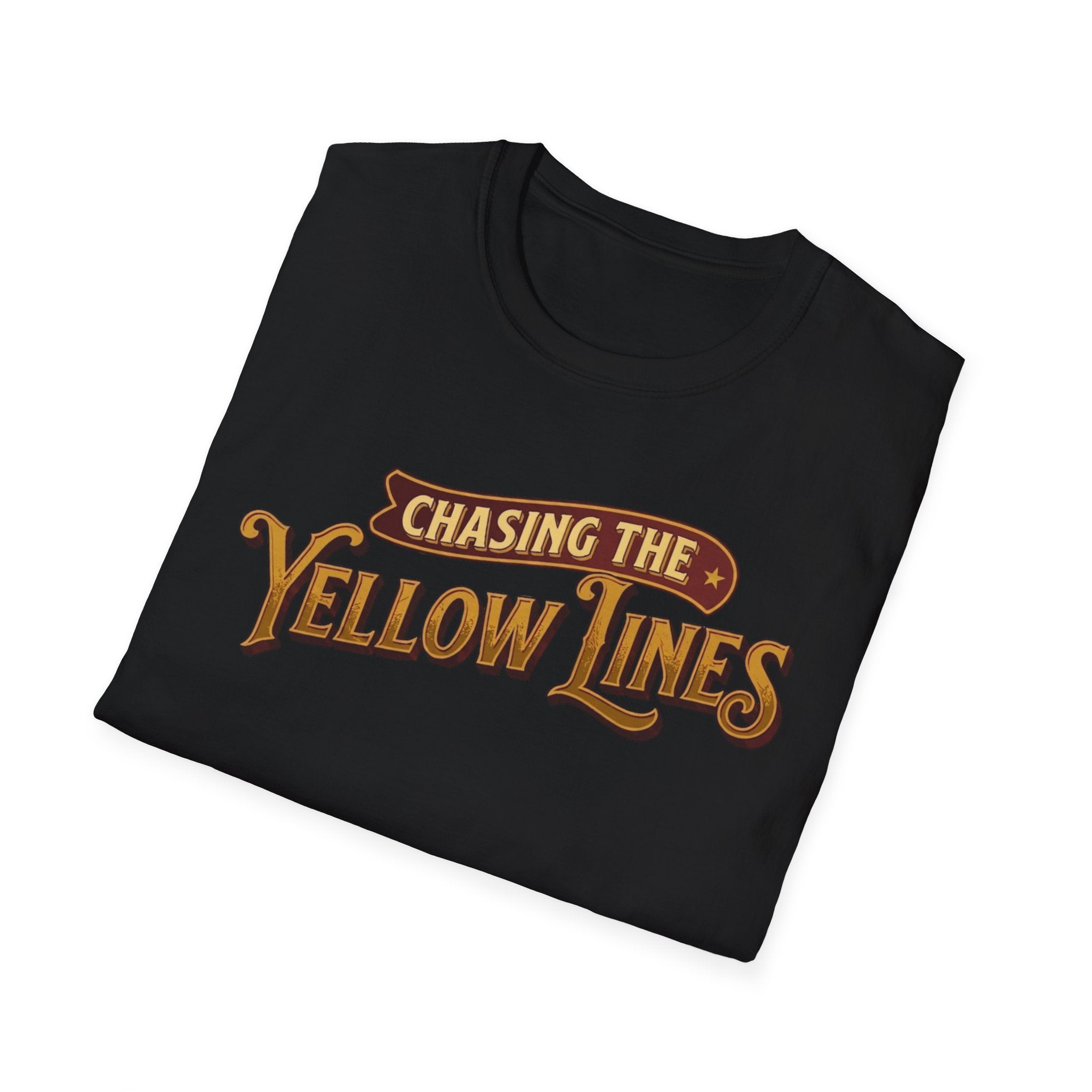 Black folded t-shirt with "Chasing The Yellow Lines" on the chest against a white background.
