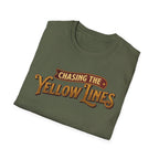 Military green t-shirt folded with "Chasing The Yellow Lines" on the chest against a white background.