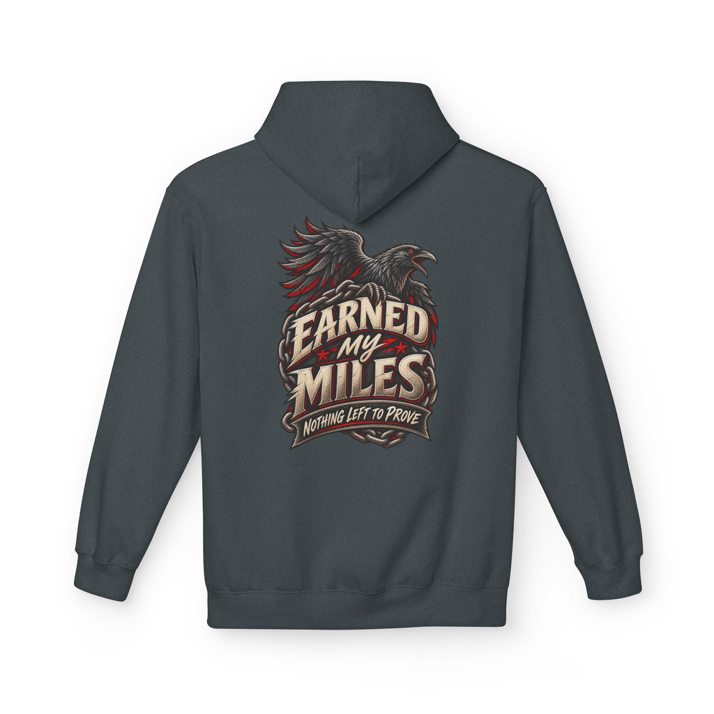 A dark heather hoodie shown from the back, featuring a graphic print of a raven and the text 'EARNED MY MILES' with 'NOTHING LEFT TO PROVE' underneath.