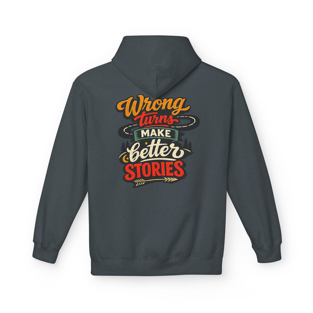 A dark heather hoodie shown from the back, featuring a colorful graphic text print that reads 'Wrong turns make better stories' in orange, red, cream, and black lettering.
