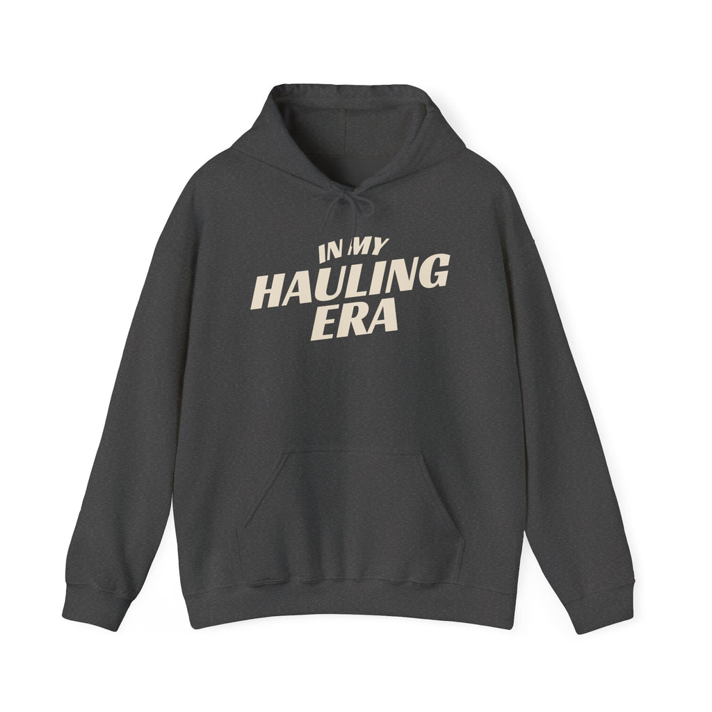 dark heather hoodie 'In My Hauling Era' on a white background
