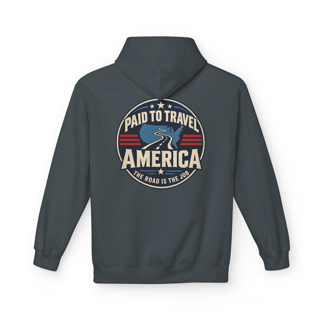 A dark heather hoodie shown from the back, featuring a circular graphic print with the text 'PAID TO TRAVEL AMERICA' 'THE ROAD IS THE JOB' and a blue map of the United States on a white background.