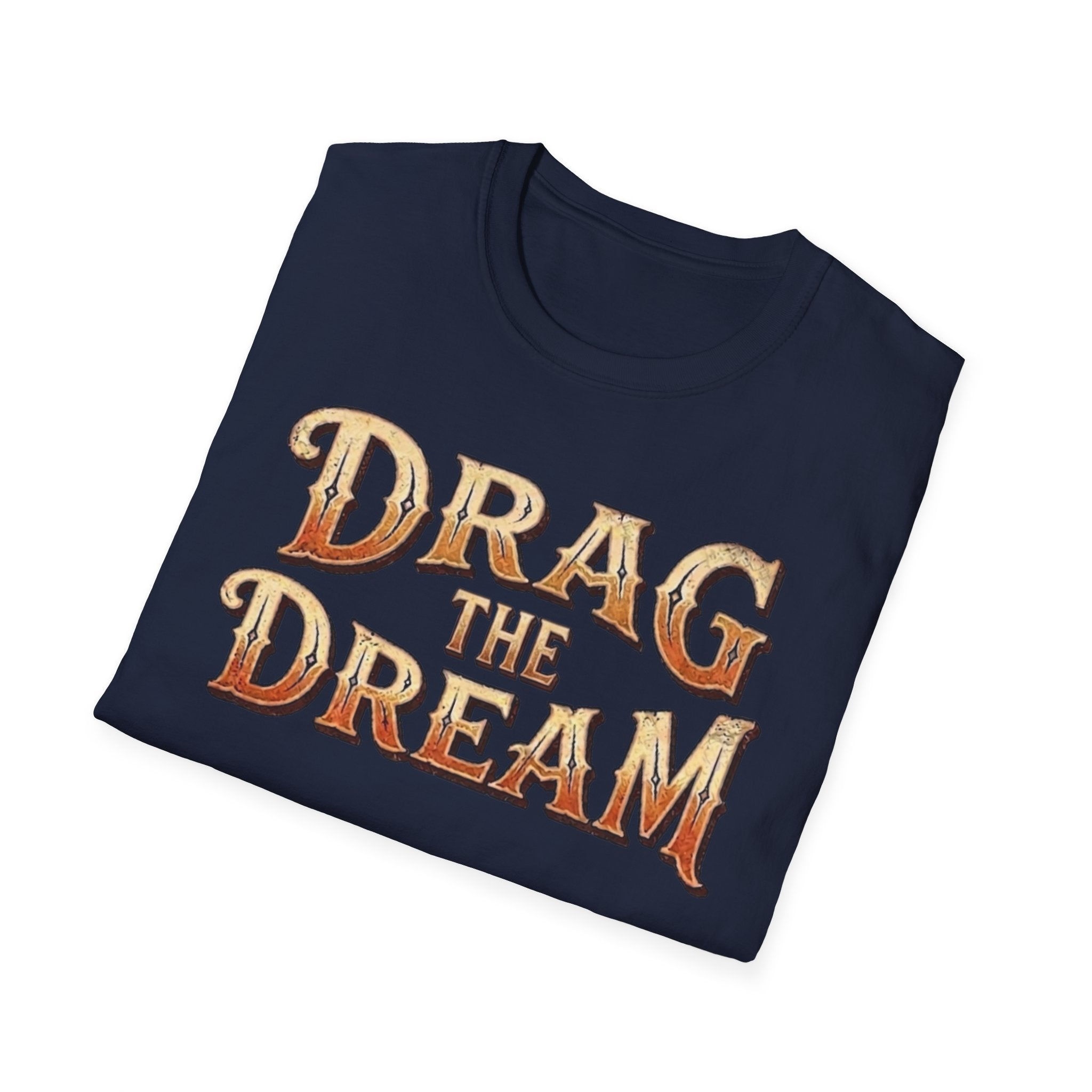 A navy blue folded t-shirt with the phrase 'DRAG THE DREAM' printed in a distressed, metallic gold and orange font on the front, set against a plain white background.