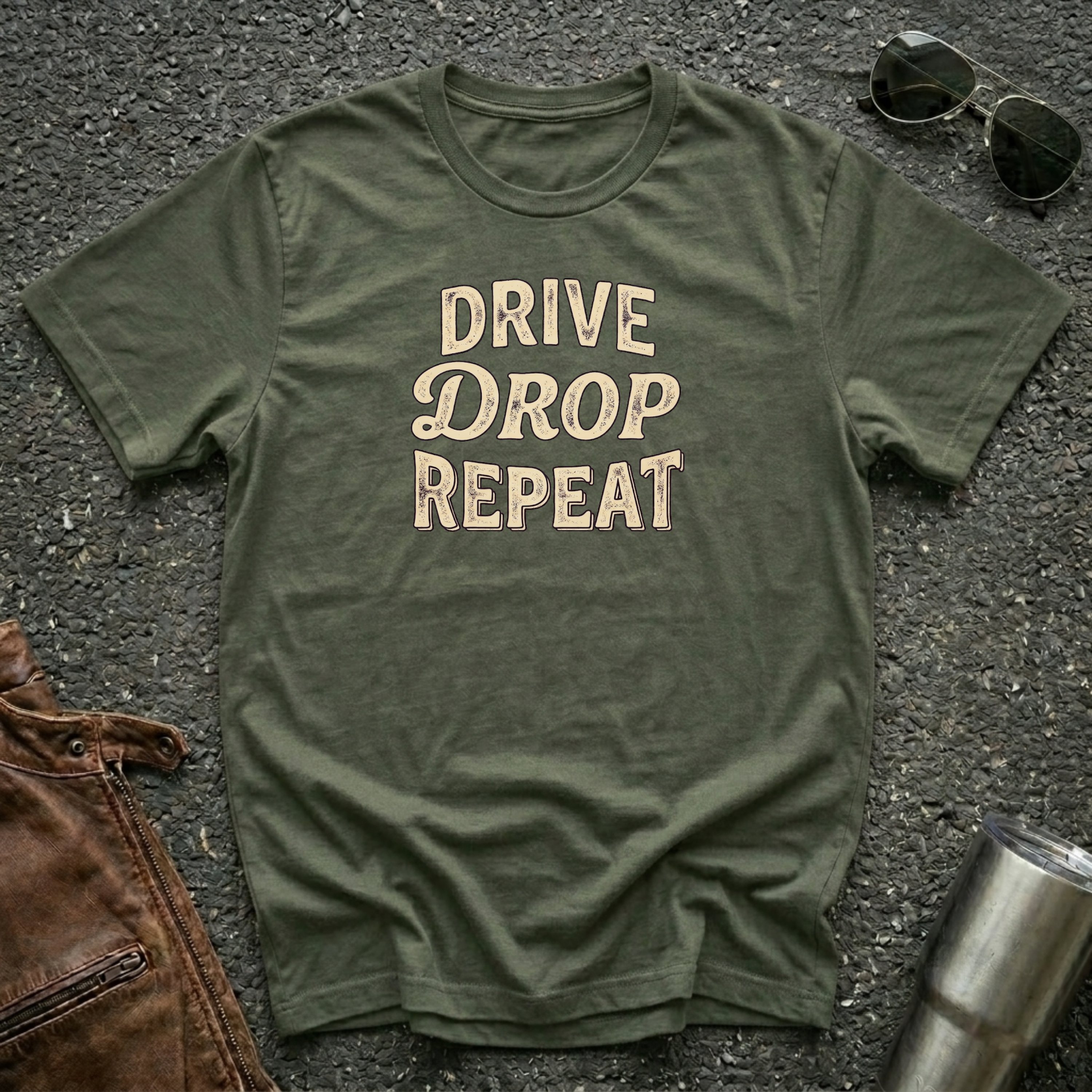 Drive Drop Repeat typography T-shirt on military green  Gildan 64000 unisex tee flat lay