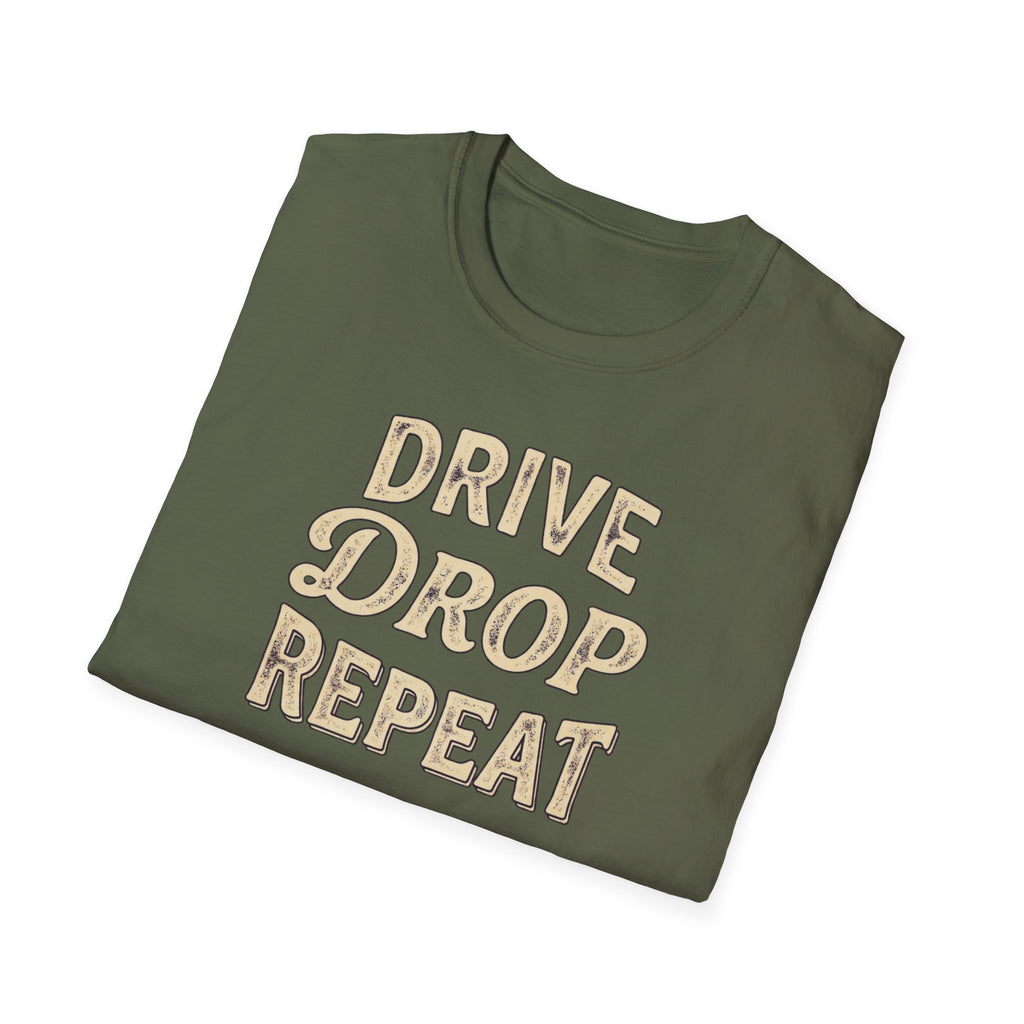 Folded military green t-shirt typography vintage style with words Drive Drop Repeat on the front.