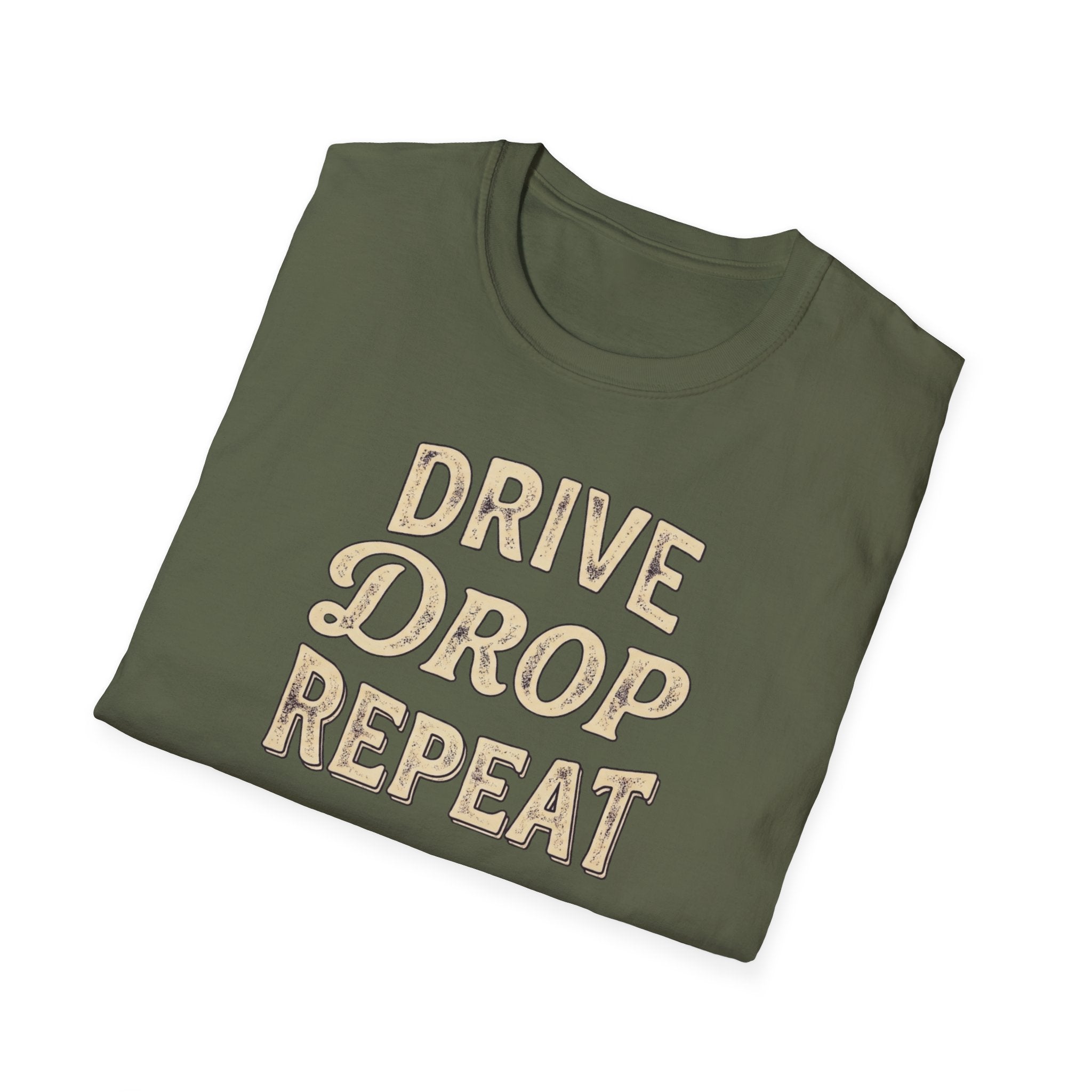Folded military green t-shirt typography vintage style with words Drive Drop Repeat on the front.