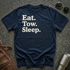 A navy crewneck t-shirt with the text 'Eat. Tow. Sleep.'
