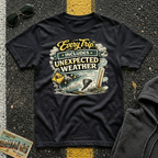 Every Trip Includes Unexpected Weather T-shirt by The Riverstone Life on a black Gildan Softstyle 64000 featuring a vintage weather-themed highway design.