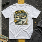 Every Trip Includes Unexpected Weather T-shirt by The Riverstone Life on a white Gildan Softstyle 64000 featuring a vintage weather-themed highway design.