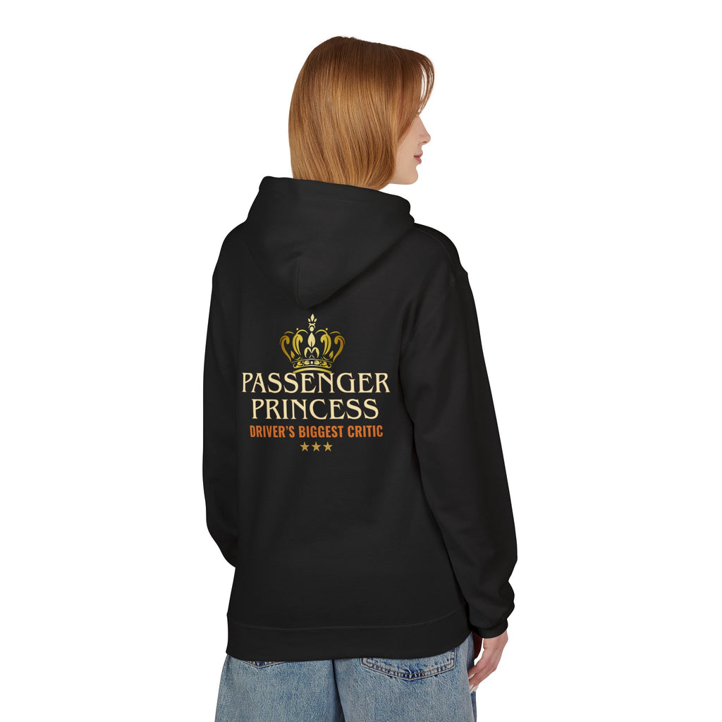 A woman shown from the back wearing a black hoodie with a gold and orange graphic on the back that reads 'PASSENGER PRINCESS' and 'DRIVER'S BIGGEST CRITIC'.