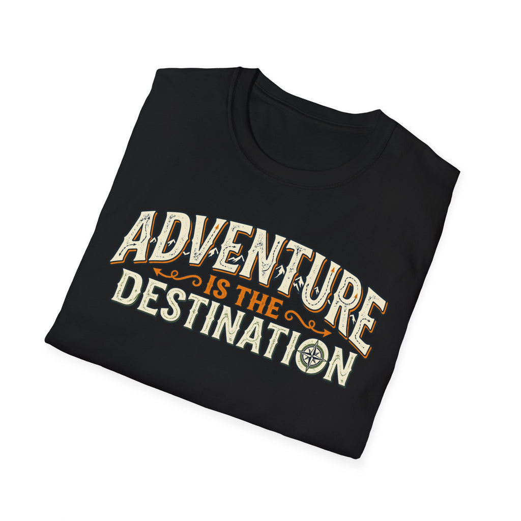 A folded black t-shirt with a vintage-style graphic that reads 'ADVENTURE IS THE DESTINATION' in cream and orange lettering, displayed on a clean white background.