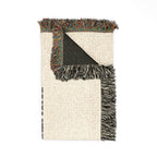 Textile with fringed edge on a white background