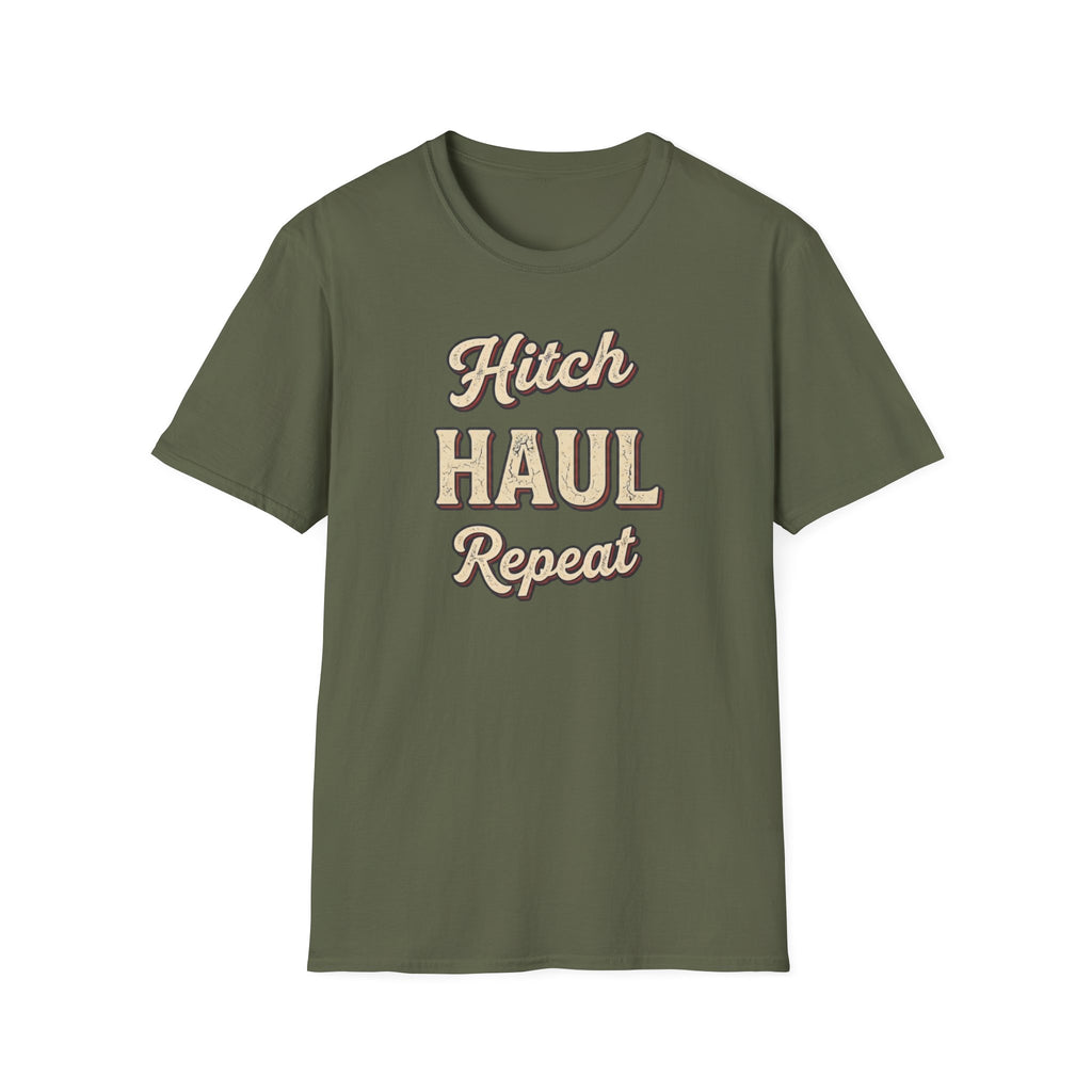 Military green t-shirt with 'Hitch Haul Repeat' typography vintage style on a white background.