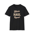 Black t-shirt with 'Hitch Haul Repeat' typography vintage style on a white background.