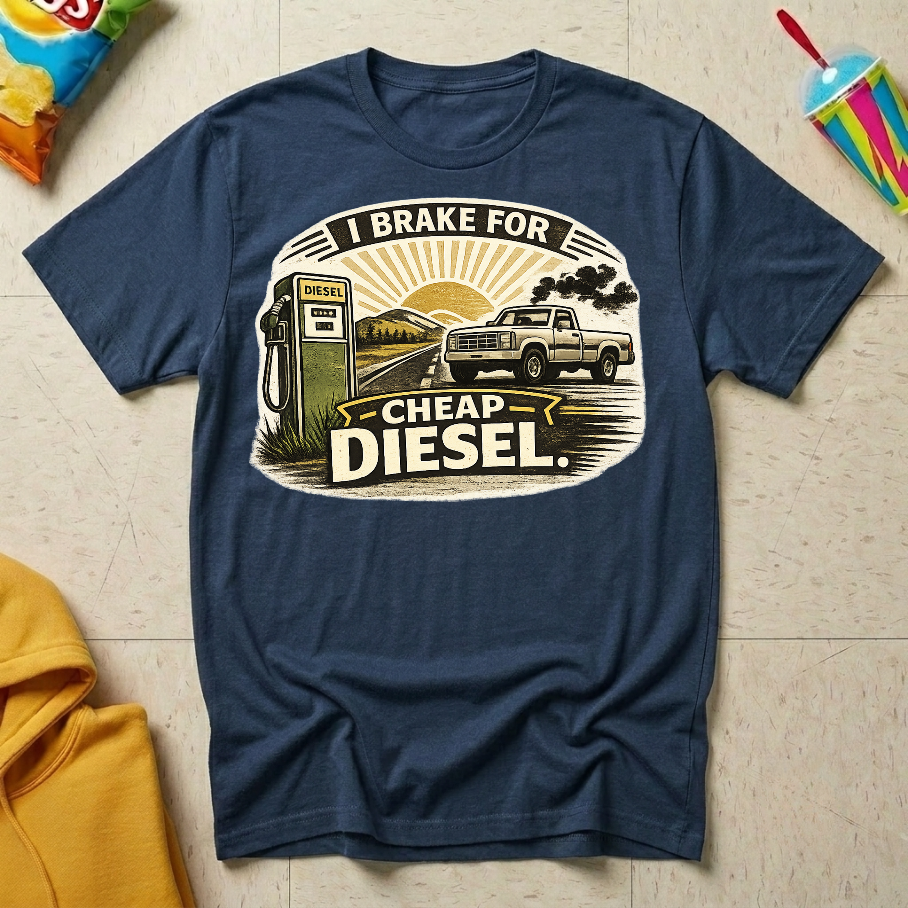 I Brake For Cheap Diesel T-shirt by The Riverstone Life on a navy Gildan Softstyle 64000 featuring a vintage diesel pump, pickup truck, and humorous road trip design.
