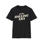 Black 'In My Hauling Era' road life t-shirt featuring bold cream typography on a soft unisex tee.