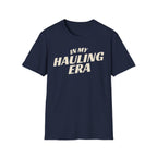 Navy 'In My Hauling Era' road life t-shirt featuring bold cream typography on a soft unisex tee.