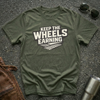 military green t-shirt 'Keep The Wheels Earning' with tire tracks flat mockup
