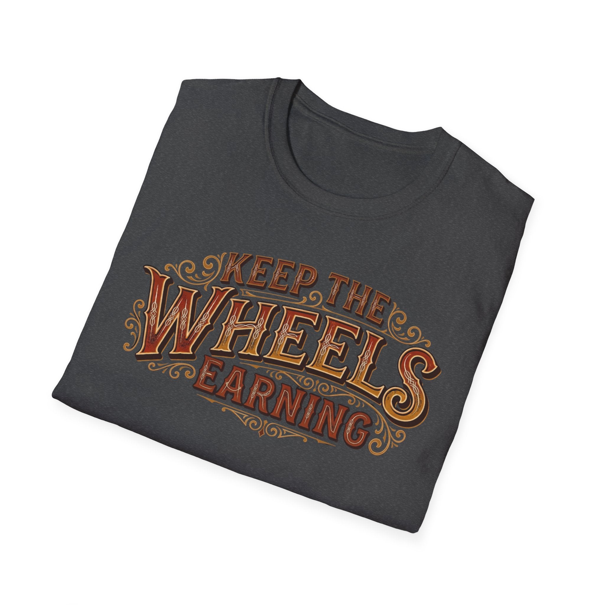Dark heather folded 'Keep The Wheels Earning' vintage RV Transport T-shirt featuring vintage gold and rust typography on a soft unisex tee on a white background.