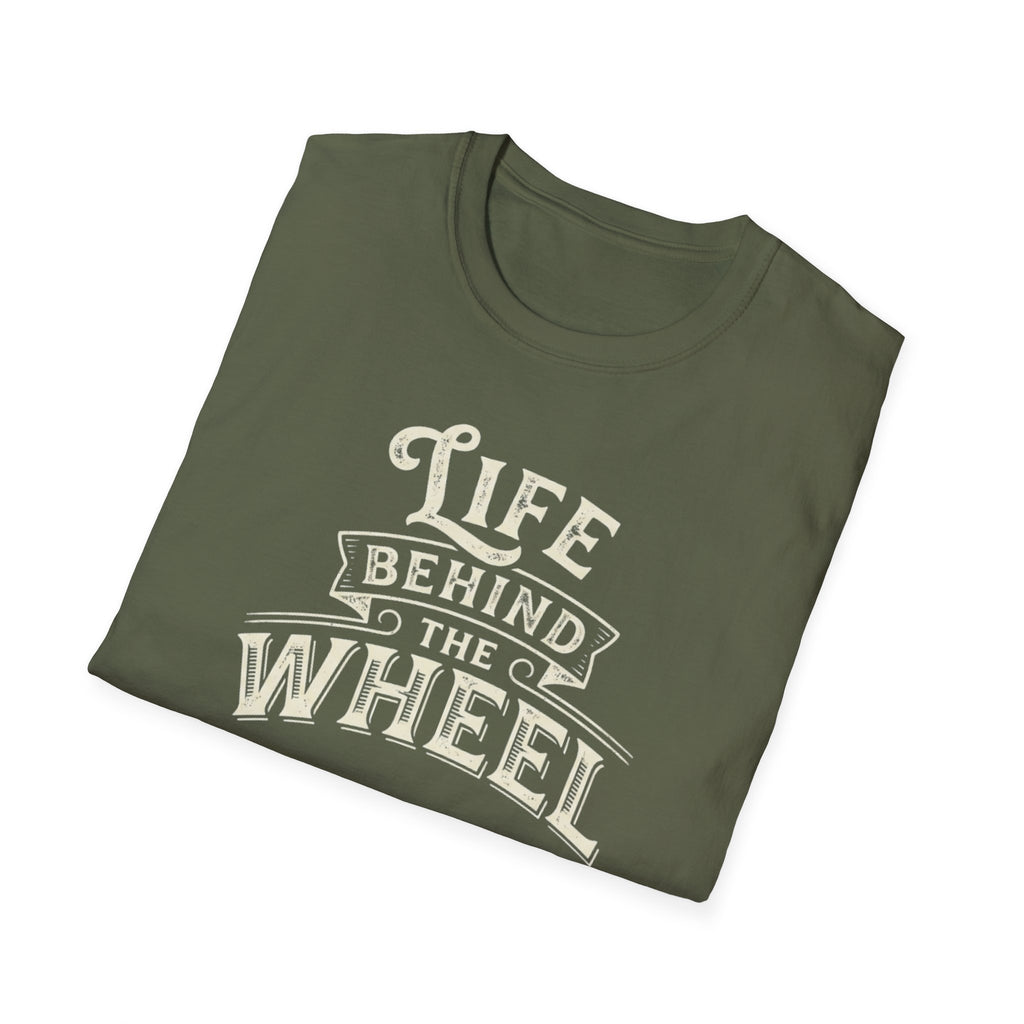 A black short-sleeve t-shirt with a distressed cream graphic reading 'LIFE BEHIND THE WHEEL' folded white background
