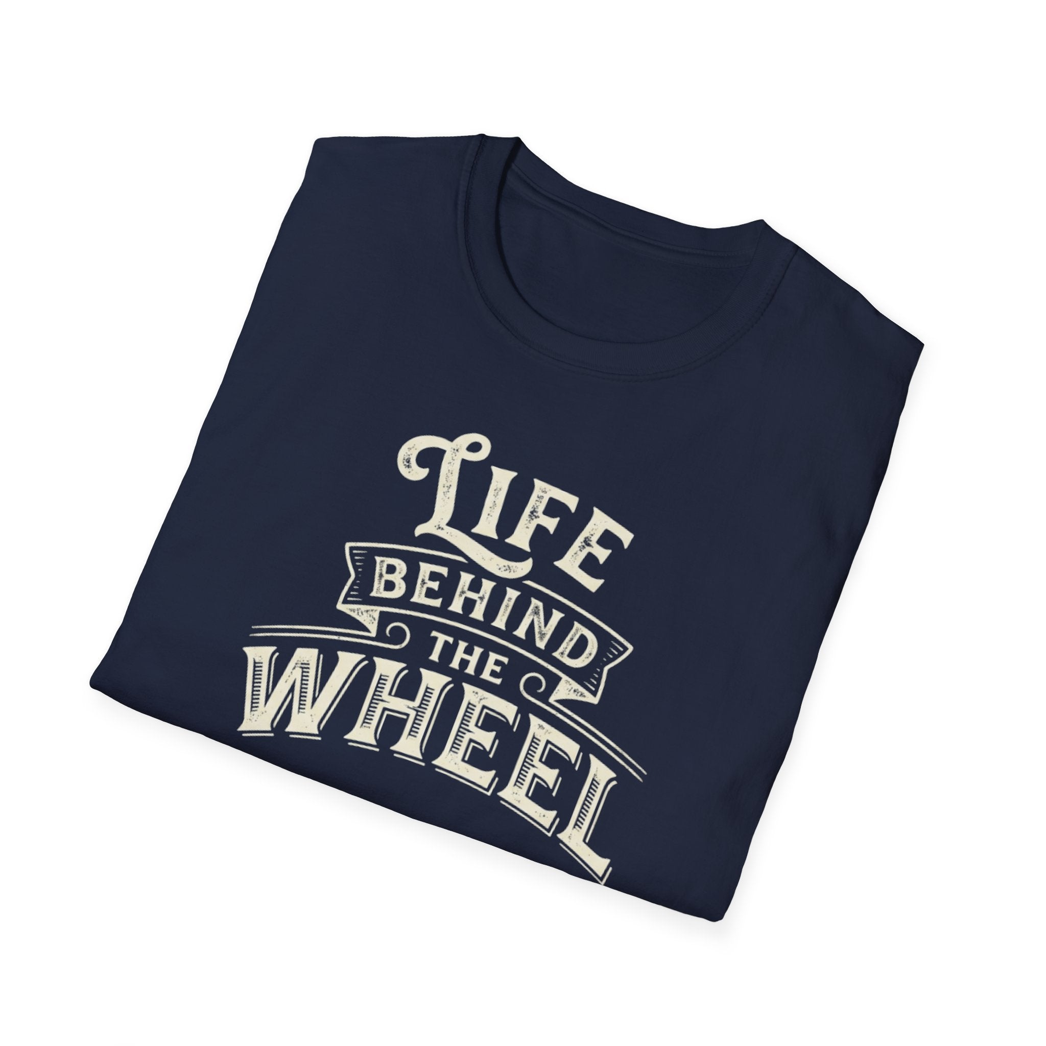 A navy short-sleeve t-shirt with a distressed cream graphic reading 'LIFE BEHIND THE WHEEL' folded white background