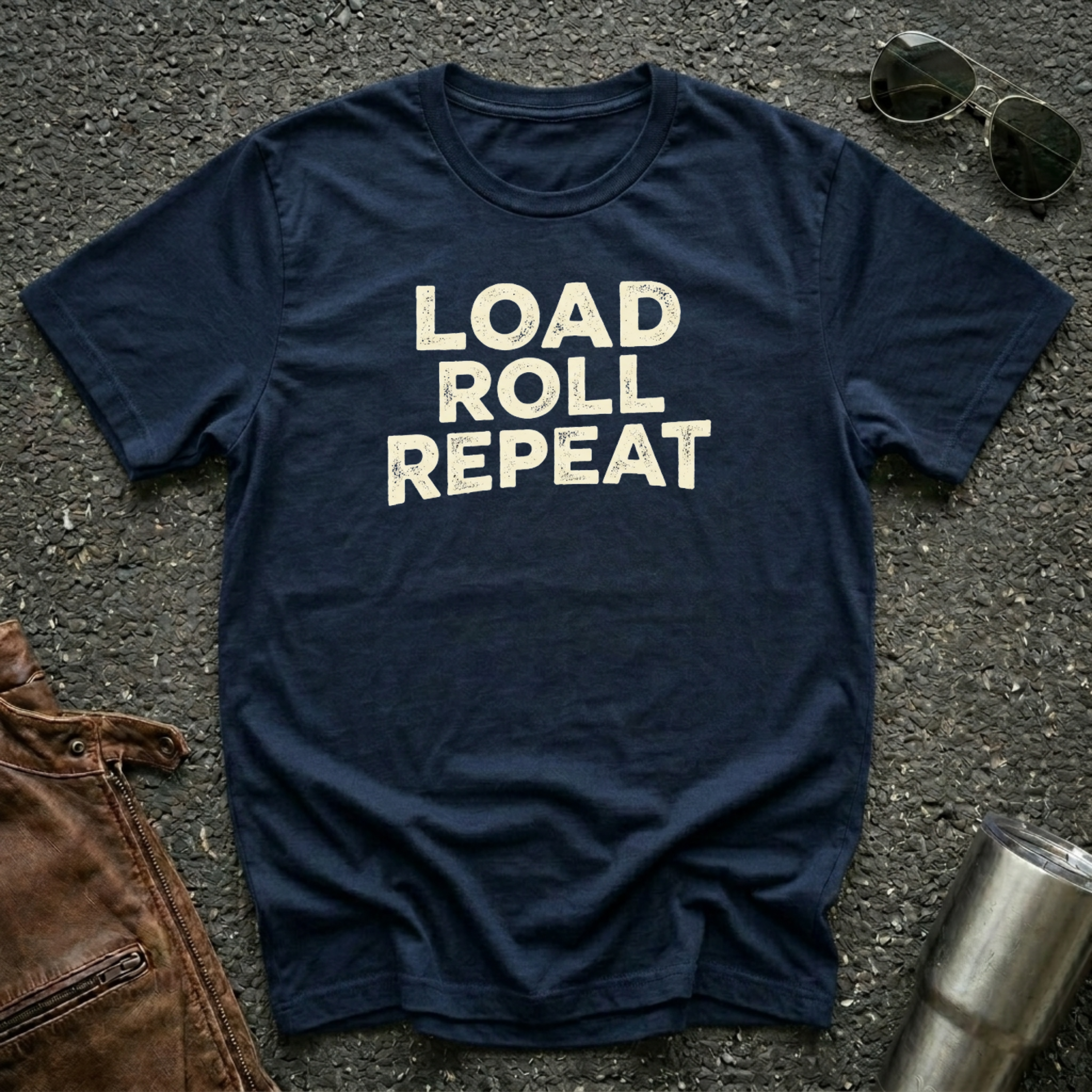 'Load Roll Repeat' typography design on navy Gildan 64000 unisex t-shirt