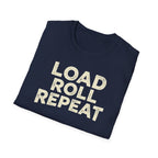 A navy blue folded t-shirt with the phrase 'LOAD ROLL REPEAT' printed in distressed cream-colored block letters, shown on a plain white background.