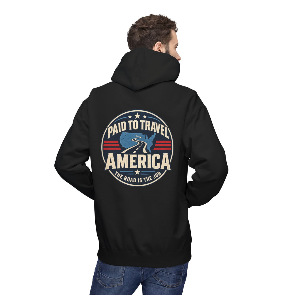 Person wearing a black hoodie with a graphic and text on the back 'PAID TO TRAVEL AMERICA' 'THE ROAD IS THE JOB', on a white background