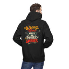 A man wearing a black hoodie, viewed from the back, featuring a colorful retro-style graphic on the back that reads 'Wrong Turns Make Better Stories' in orange, red, and cream lettering.