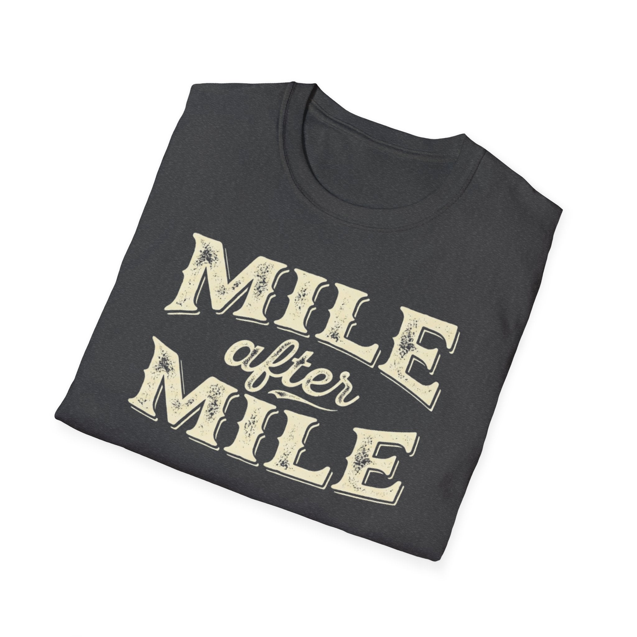 Dark heather folded 'Mile After mile' t-shirt with a white background.