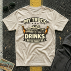 My Truck Drinks Better Than I Do T-shirt by The Riverstone Life on a natural Gildan Softstyle 64000 featuring a vintage pickup truck and humorous fuel themed design.