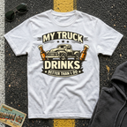 My Truck Drinks Better Than I Do T-shirt by The Riverstone Life on a white Gildan Softstyle 64000 featuring a vintage pickup truck and humorous fuel themed design.