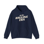 Navy hoodie 'In my Hauling Era' with a white background