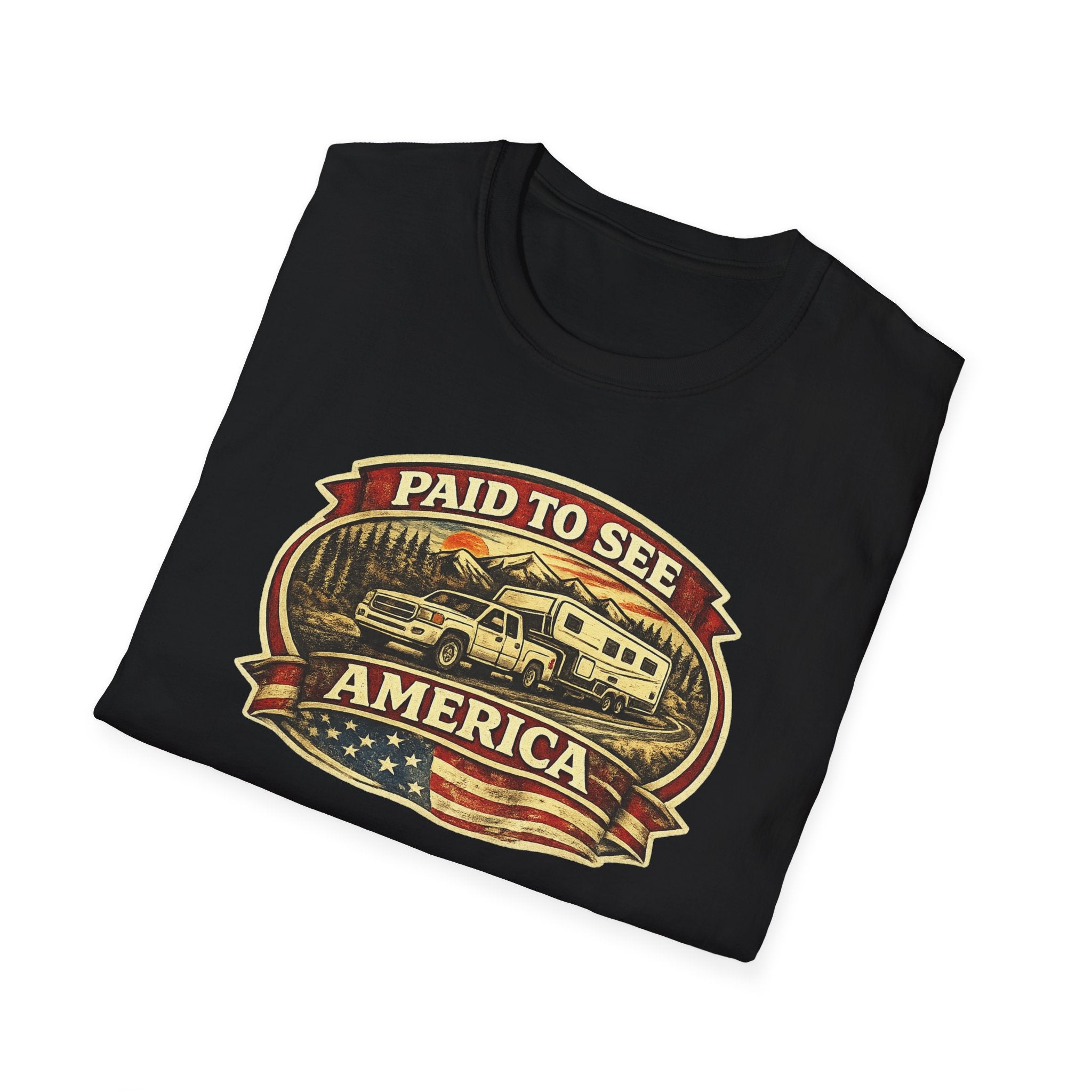 Black folded RV Transport T-shirt featuring a white pickup truck towing a camper, an America flag, and a phrase "Paid to See America" white background
