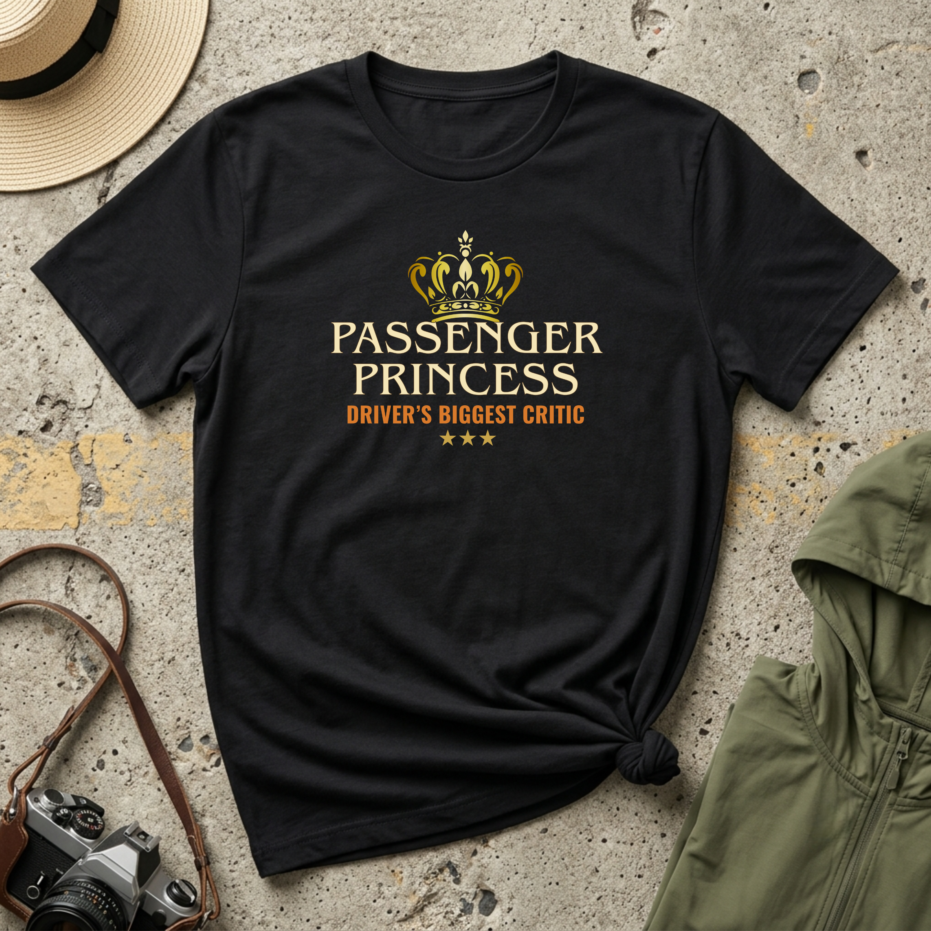 Black 'Passenger Princess Driver's Biggest Critic' t-shirt featuring a gold crown and vintage inspired typography with three gold stars