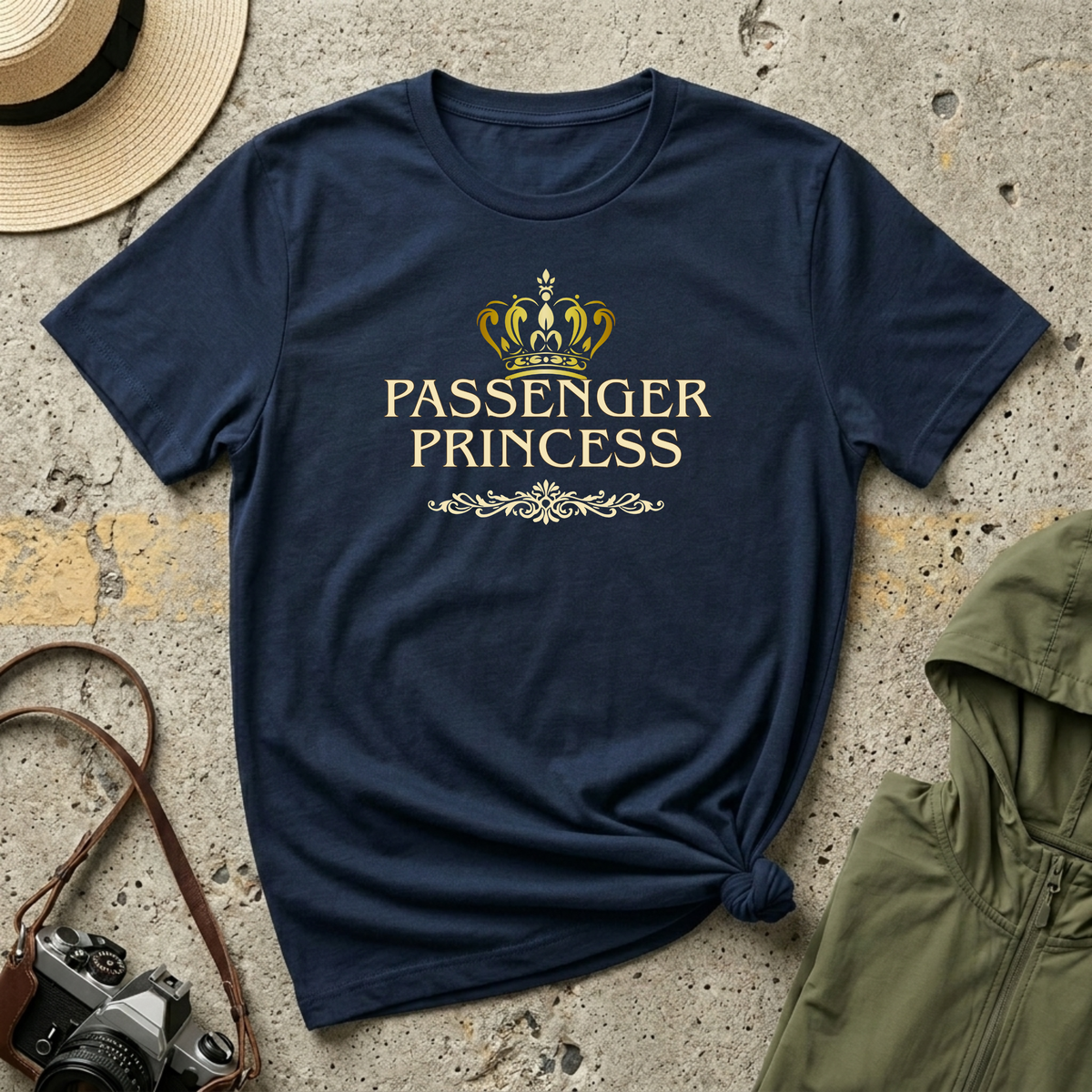 'Passenger Princess' navy T-shirt featuring a gold crown and vintage typography.