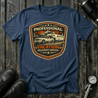 Professional Vacation Delivery Driver light truck T-shirt by The Riverstone Life on a navy Gildan Softstyle 64000 featuring a pickup truck hauling a fifth-wheel RV through a mountain landscape.