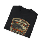 Black folded RV Transport T-shirt featuring a pickup truck towing a camper with the phrase "Professional Vacation Delivery Driver" in a vintage badge design