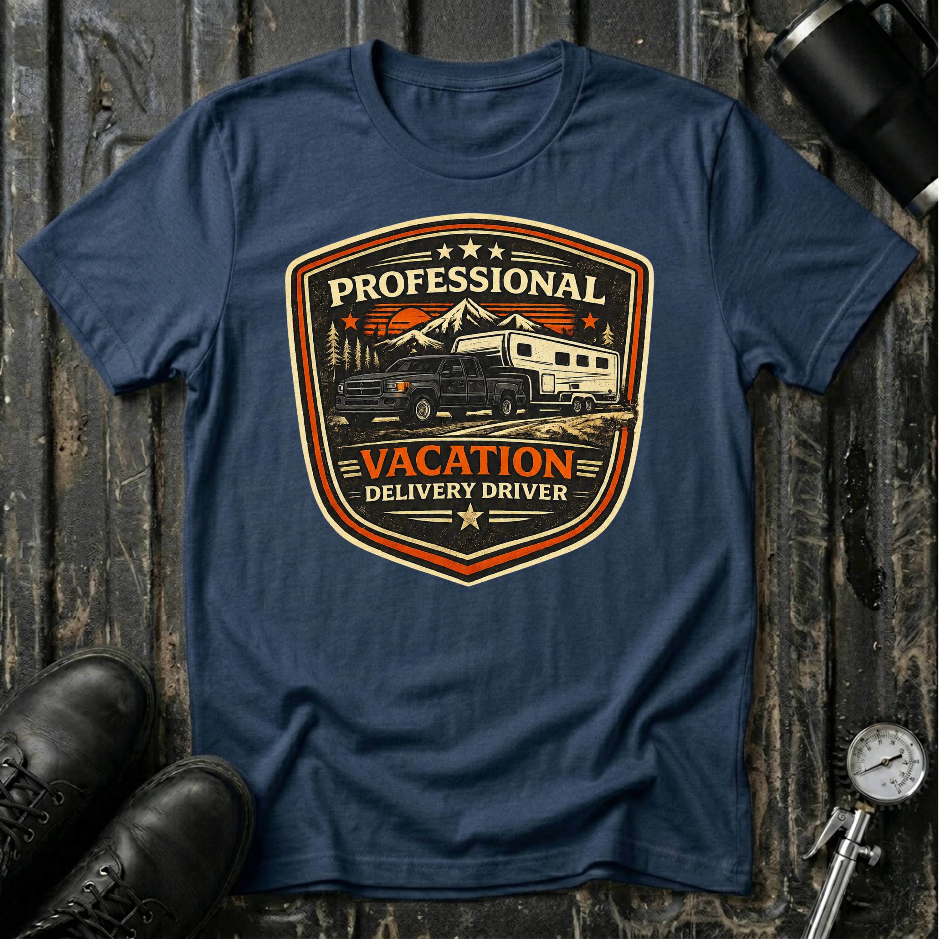 Professional Vacation Delivery Driver dark truck T-shirt by The Riverstone Life on a navy Gildan Softstyle 64000 featuring a pickup truck hauling a fifth-wheel Rv through a mountain landscape.