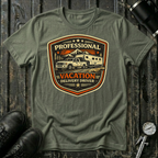 Professional Vacation Delivery Driver light truck T-shirt by The Riverstone Life on a military green Gildan Softstyle 64000 featuring a pickup truck hauling a fifth-wheel RV through a mountain landscape.