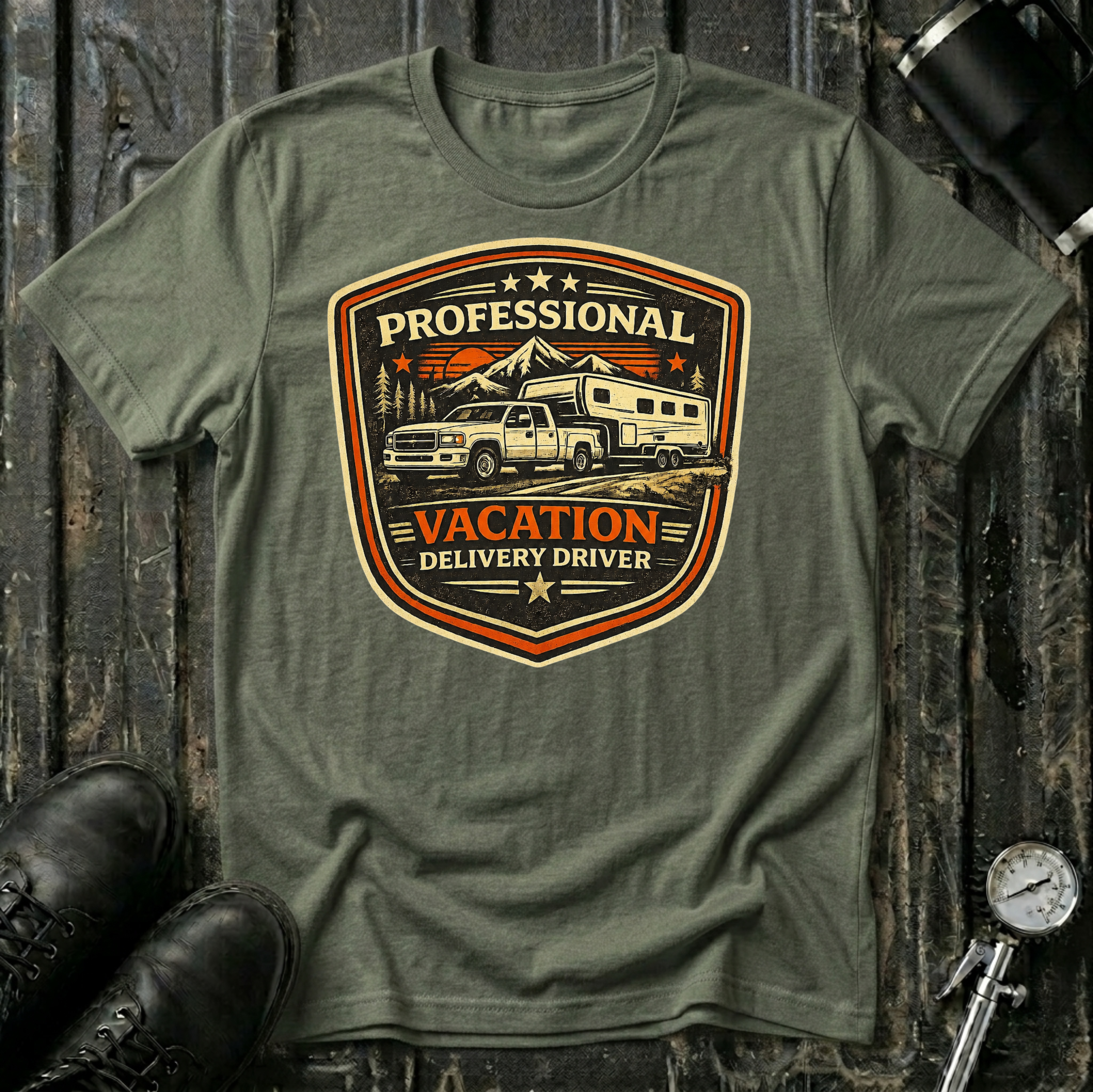 Professional Vacation Delivery Driver light truck T-shirt by The Riverstone Life on a military green Gildan Softstyle 64000 featuring a pickup truck hauling a fifth-wheel RV through a mountain landscape.