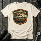 Professional Vacation Delivery Driver light truck T-shirt by The Riverstone Life on a natural Gildan Softstyle 64000 featuring a pickup truck hauling a fifth-wheel RV through a mountain landscape.