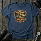 Navy RV Transport T-shirt featuring a light pickup truck towing a camper with the phrase "Professional Vacation Delivery Driver" in a vintage badge design.