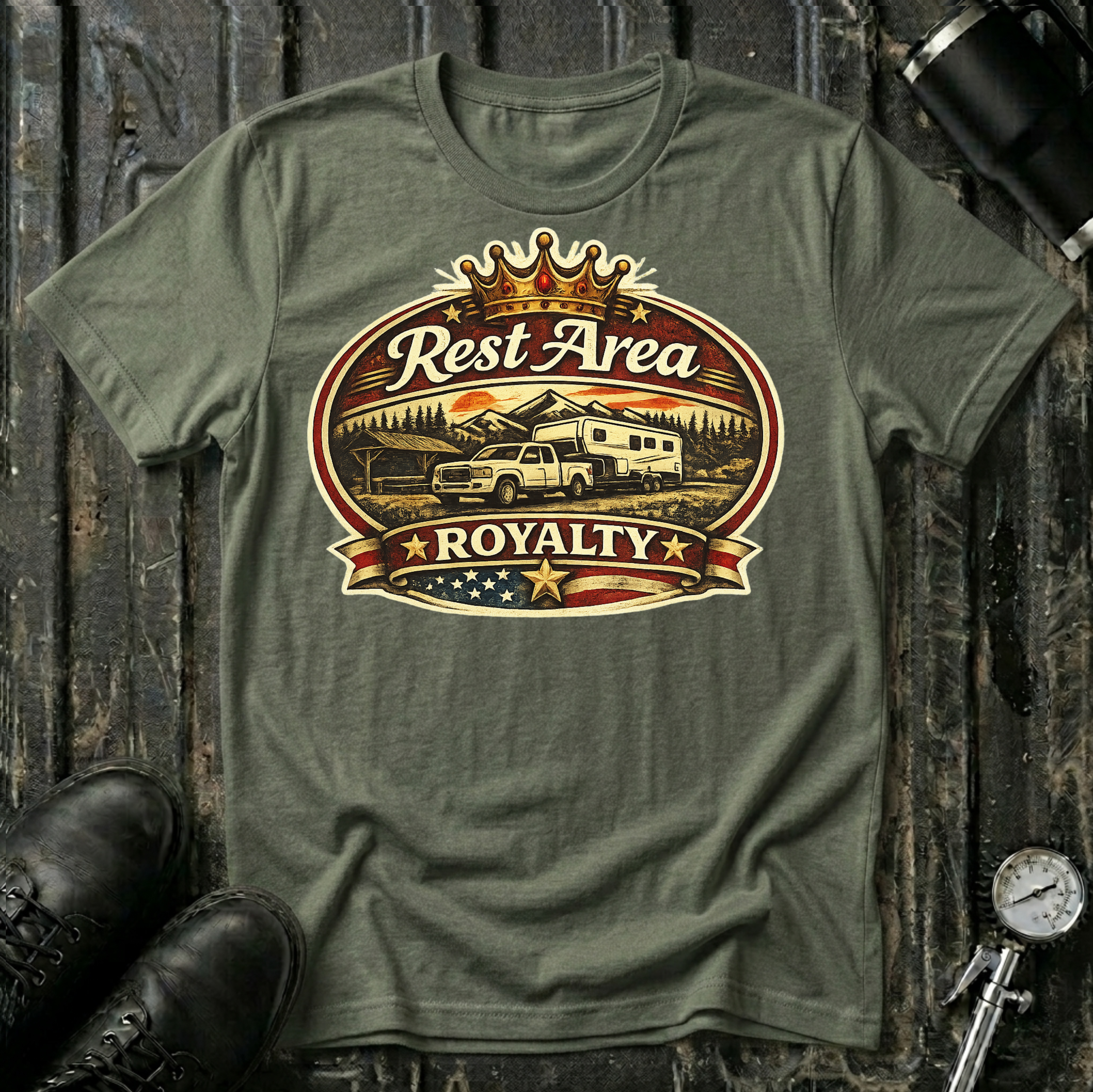 Rest Area Royalty T-shirt by The Riverstone Life on a military green Gildan Softstyle 64000 featuring a pickup truck towing an RV at a scenic rest area.