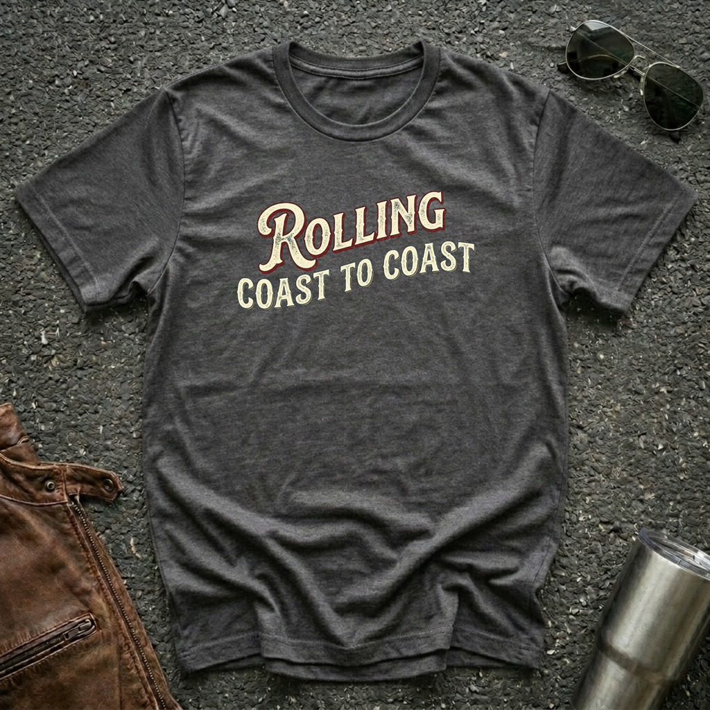 Dark heather road life T-shirt featuring the phrase "Rolling Coast to Coast" in a vintage cream and maroon typography