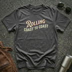 Dark heather road life T-shirt featuring the phrase "Rolling Coast to Coast" in a vintage cream and maroon typography