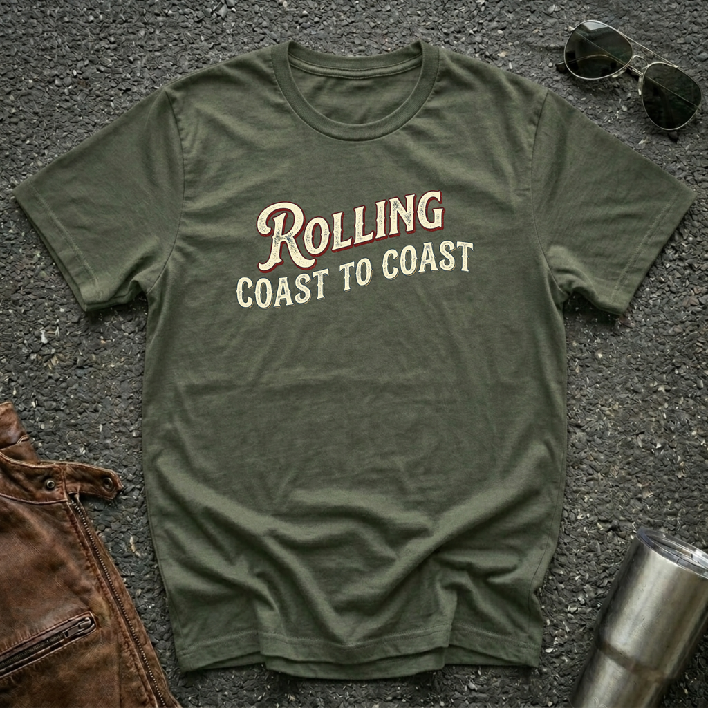 Military green road life T-shirt featuring the phrase "Rolling Coast to Coast" in a vintage cream and maroon typography